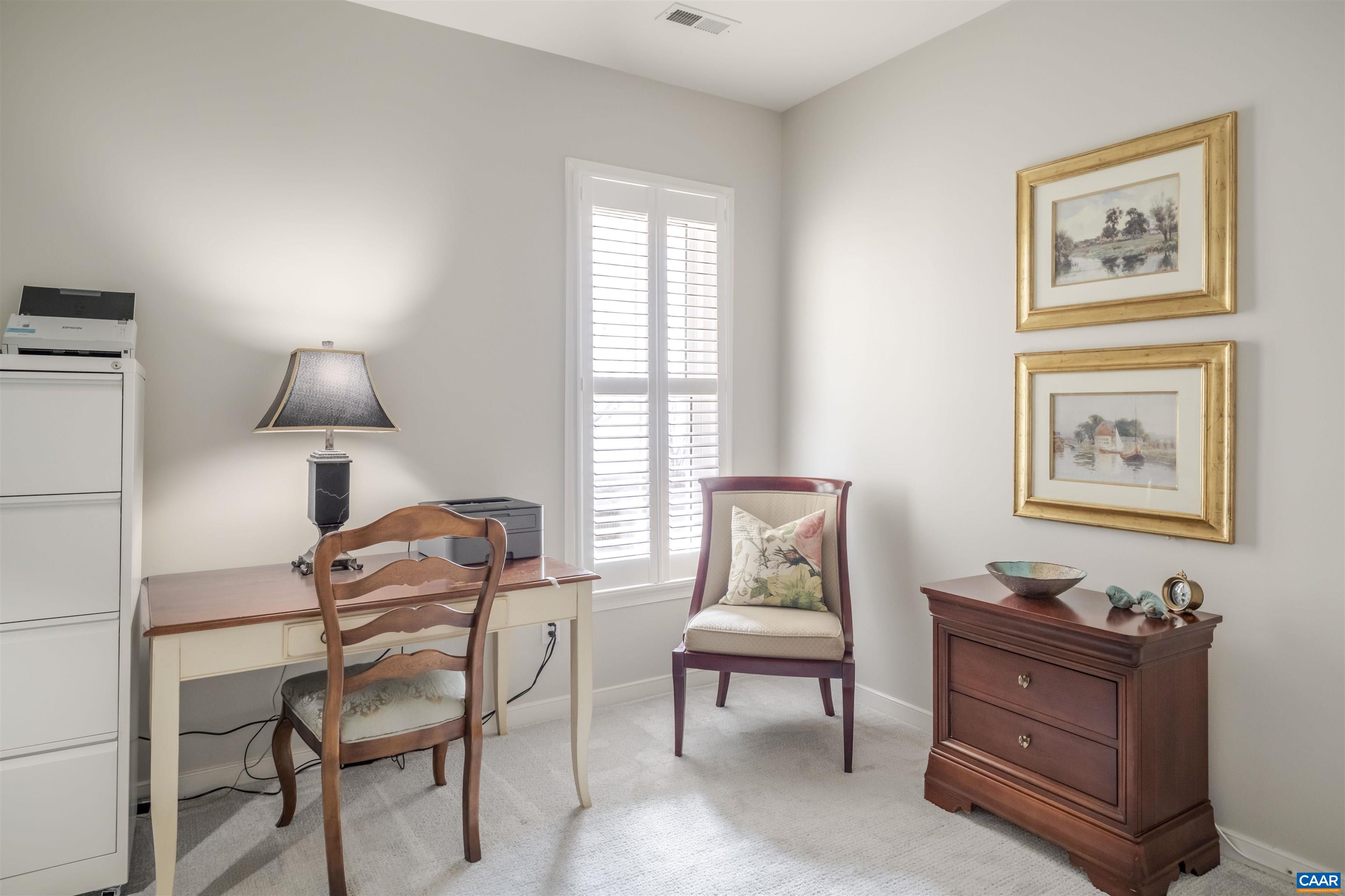 1322 Stonegate Court Crozet, VA 22932 - Photo 22 of 39 a living room with furniture and a window
