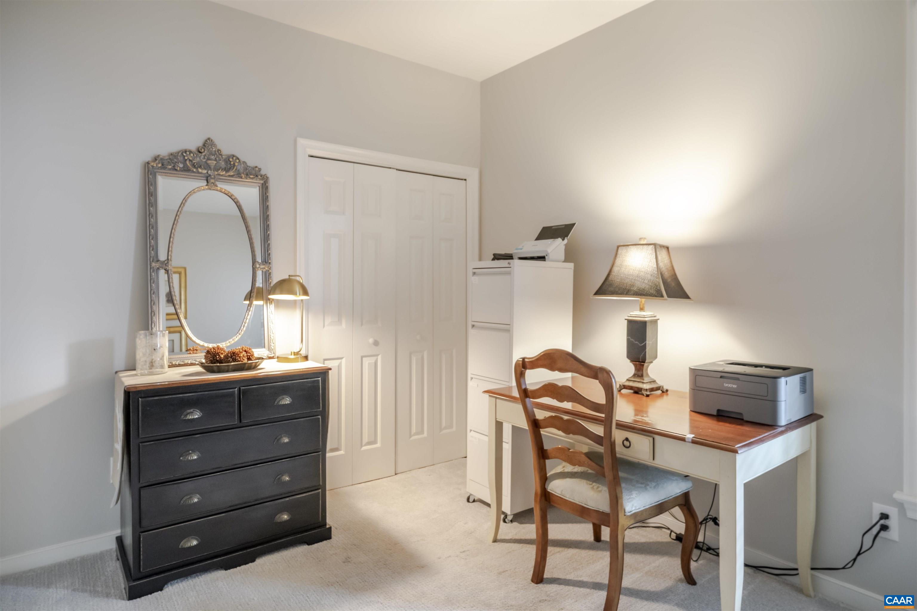 1322 Stonegate Court Crozet, VA 22932 - Photo 23 of 39 a room with a chair and piano table