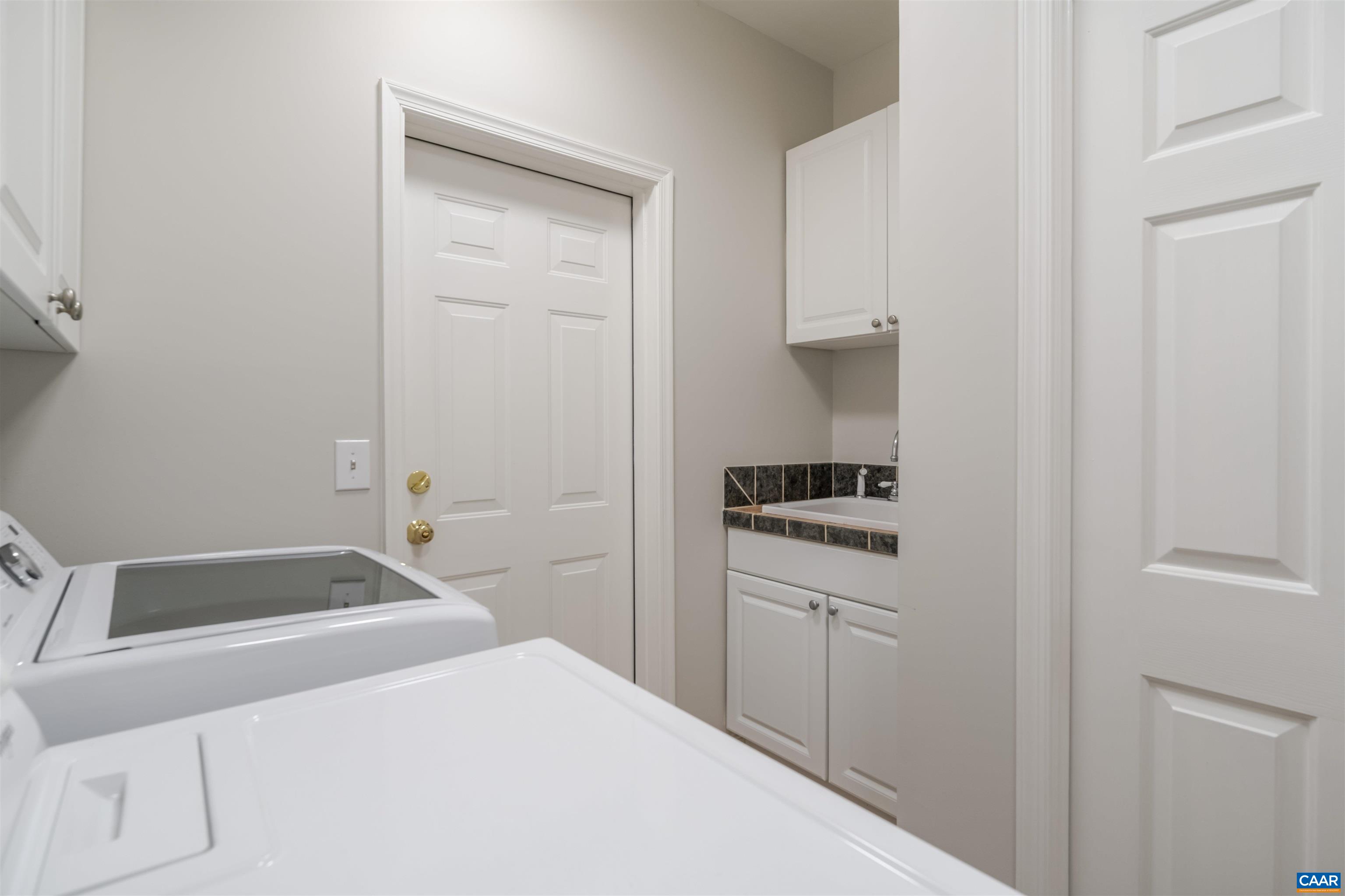 1322 Stonegate Court Crozet, VA 22932 - Photo 28 of 39 a bedroom with a bed and a sink