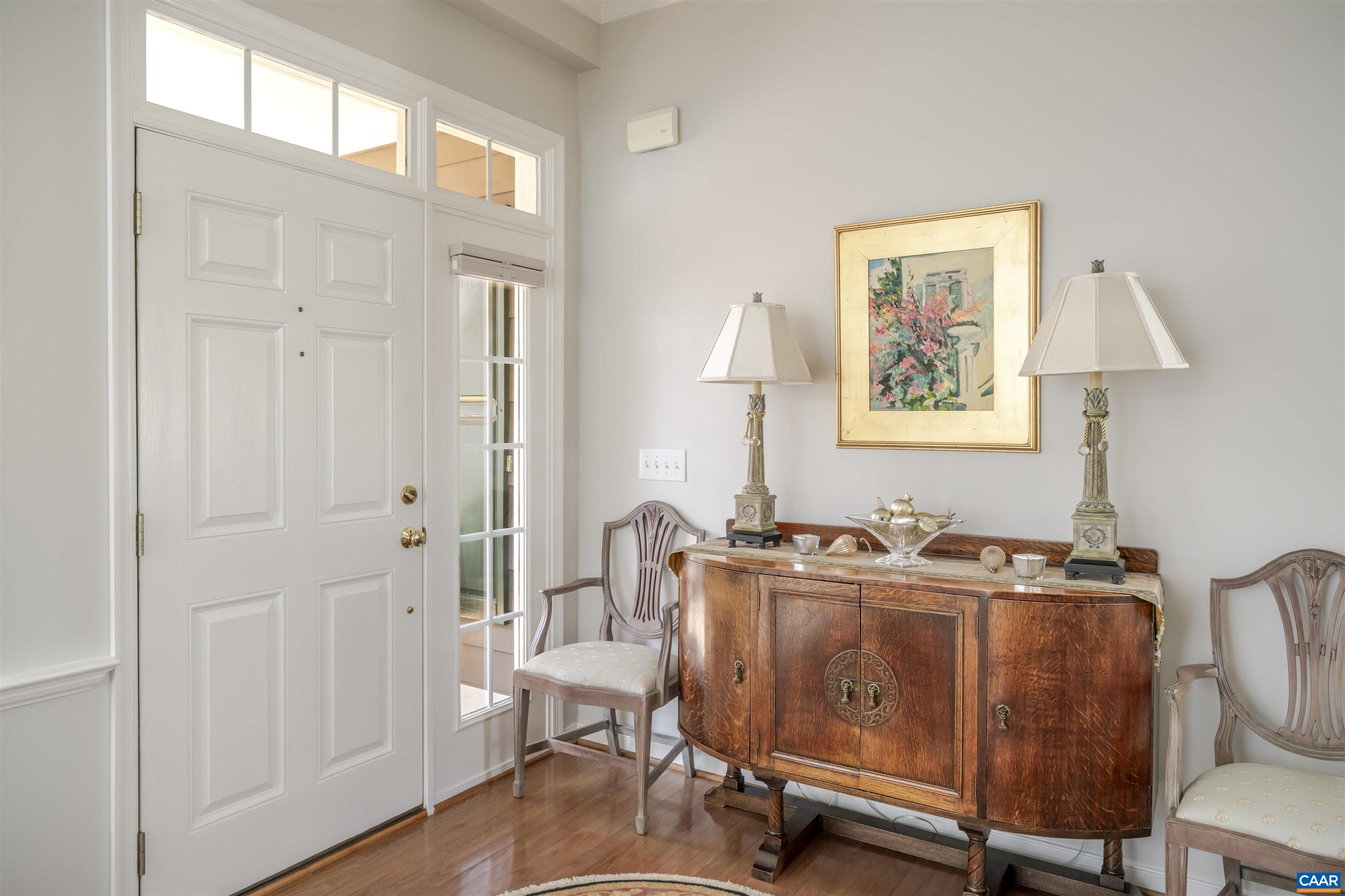 1322 Stonegate Court Crozet, VA 22932 - Photo 3 of 39 a view of a workspace with furniture and wooden floor