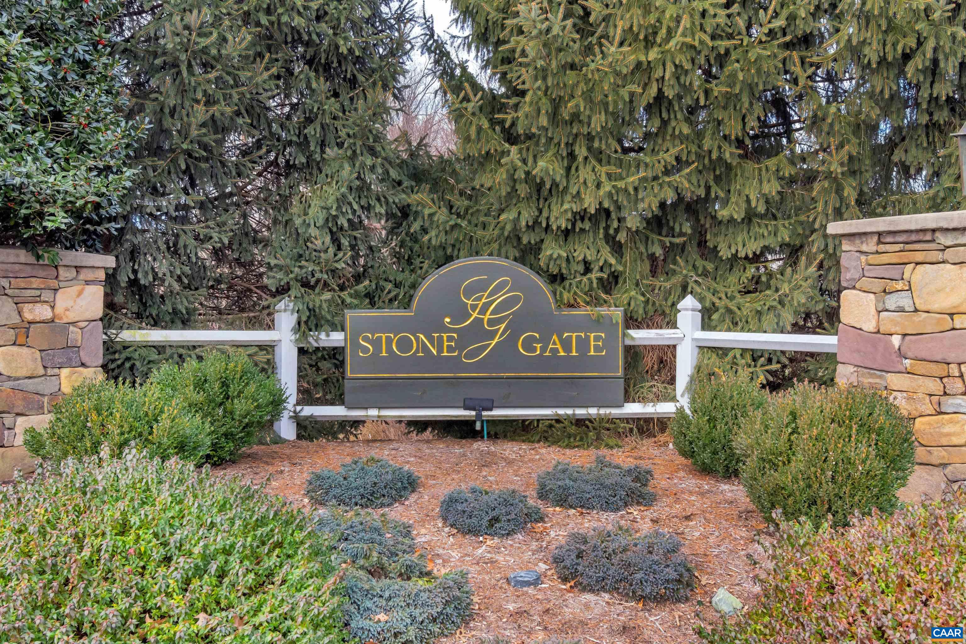 1322 Stonegate Court Crozet, VA 22932 - Photo 34 of 39 a view of a sign in front of a white house