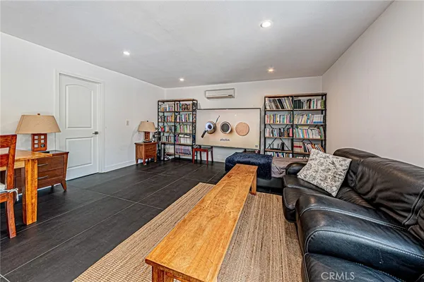 a living room with furniture and a table
