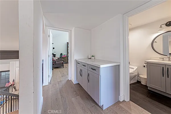 a bedroom with bed and a window