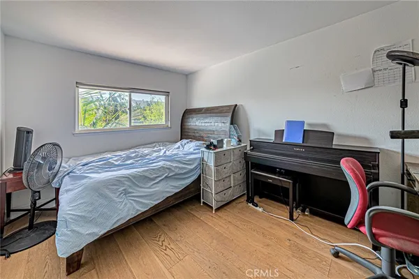 a room with furniture and flat screen tv