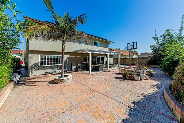 a house view with a outdoor seating space