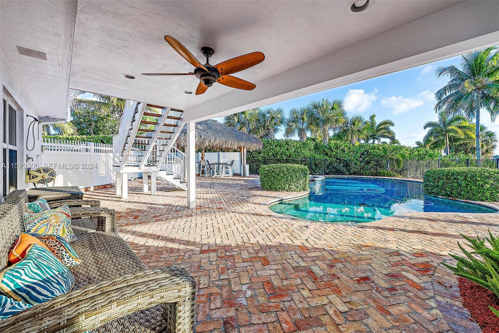 4643 Cheerio Way Stuart, FL 34997 - Photo 58 of 69 Patio Lanai Overlooking Pool