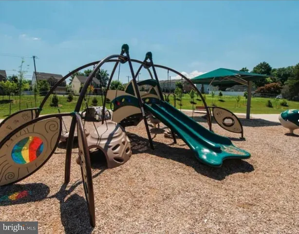 a picture of a room with a white wall and a large window