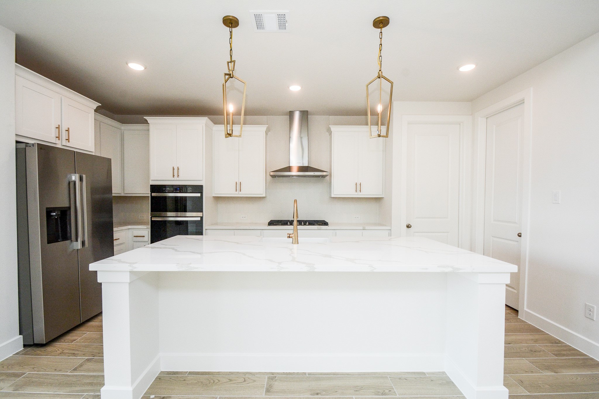 4407 Ruby Gdn Court Fulshear, TX 77441 - Photo 7 of 32 Expansive kitchen overlooking the living area