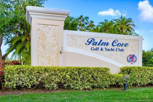 an aerial view of a houses with outdoor space and lake view