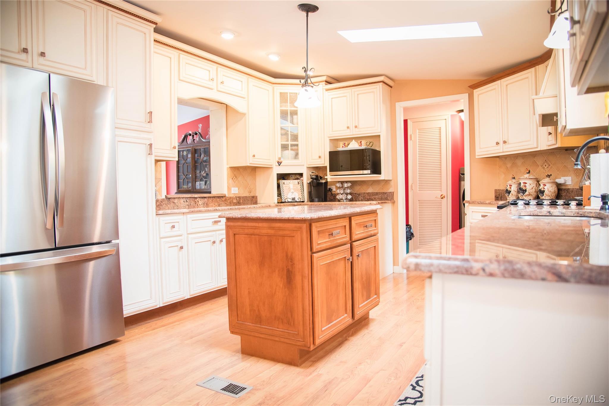 502 Myers Road Neversink, NY 12765 - Photo 15 of 38 a kitchen with stainless steel appliances granite countertop a refrigerator a sink and a stove