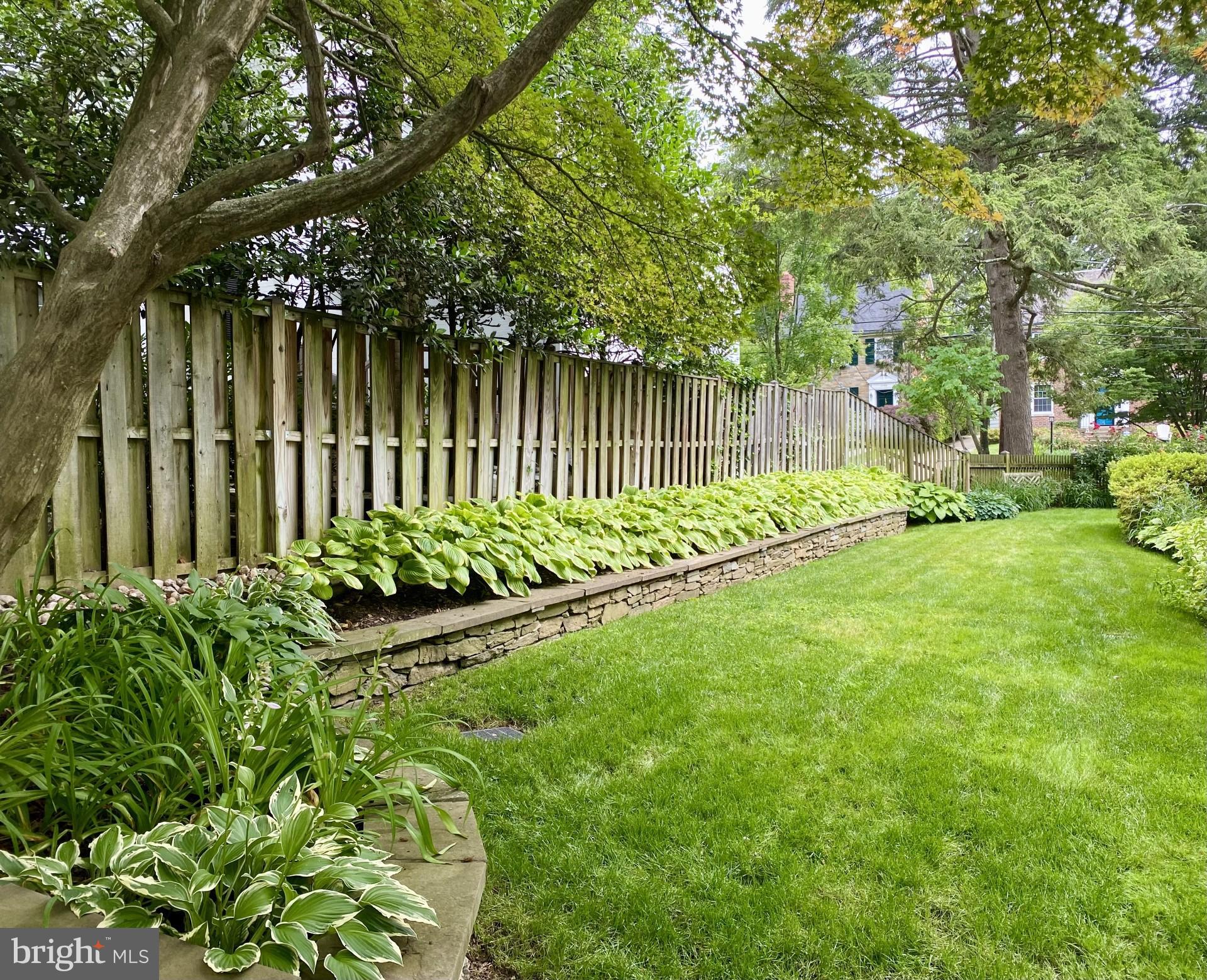 7501 Glendale Road Chevy Chase, MD 20815 - Photo 37 of 43 Yard, stone retaining wall and planting bed