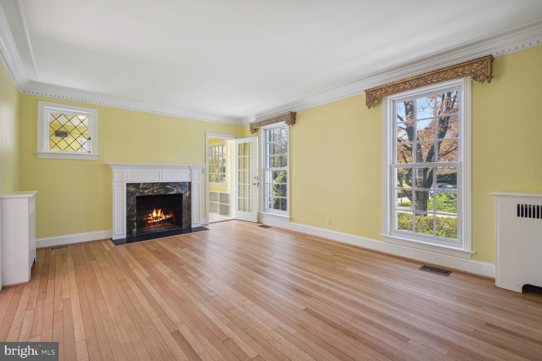 7501 Glendale Road Chevy Chase, MD 20815 - Photo 4 of 43 Living Room with wood burning fireplace