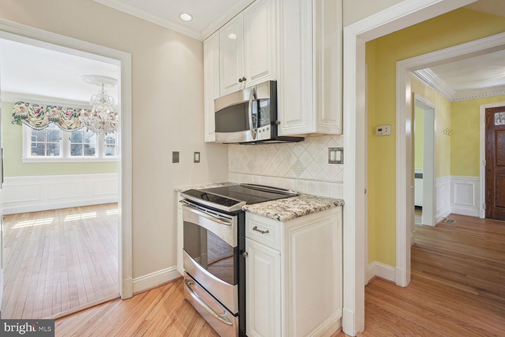 7501 Glendale Road Chevy Chase, MD 20815 - Photo 9 of 43 Kitchen with electric oven and microwave