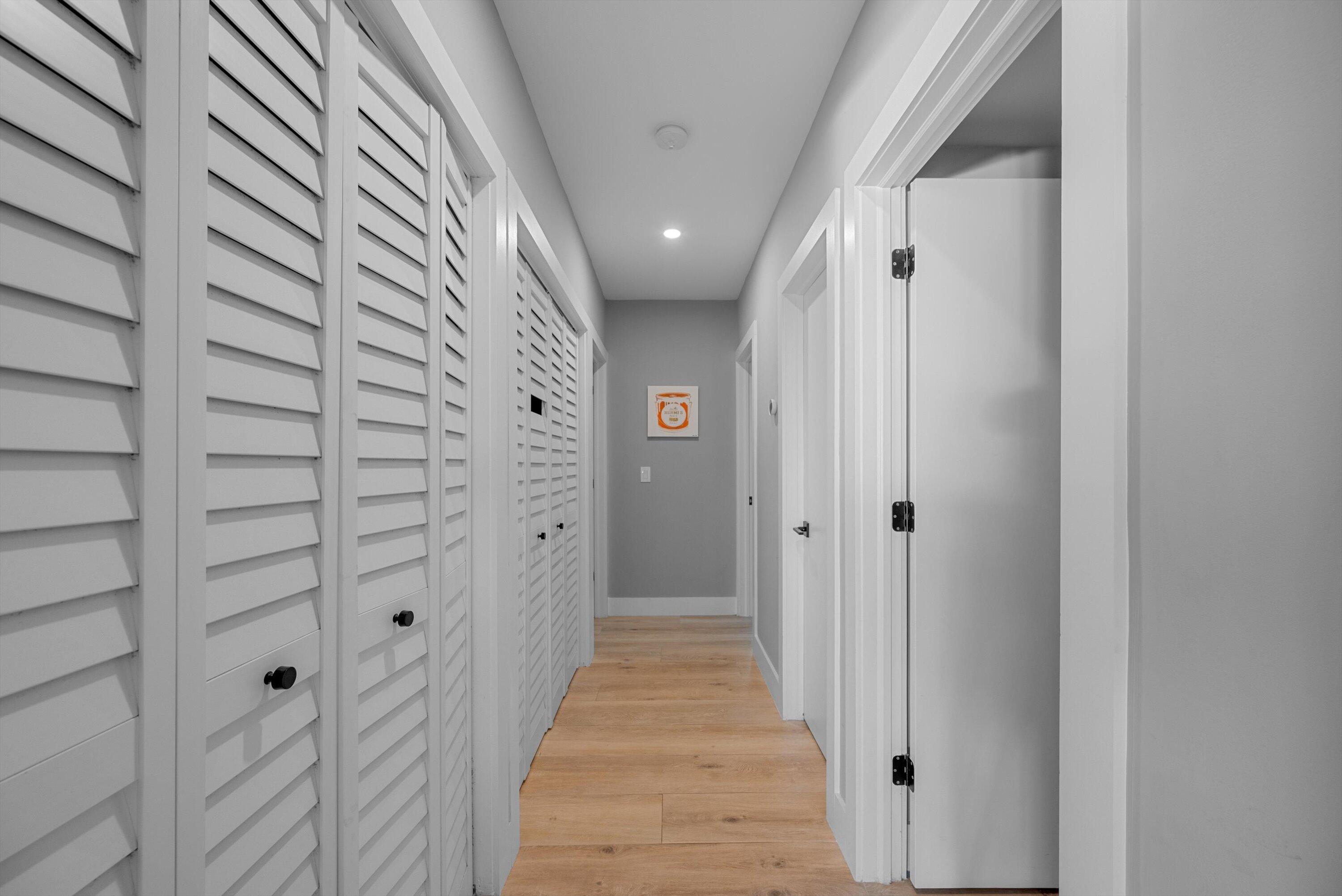 13224 Polo Club Road, Unit A204 Wellington, FL 33414 - Photo 11 of 27 a view of a hallway with wooden floor and staircase