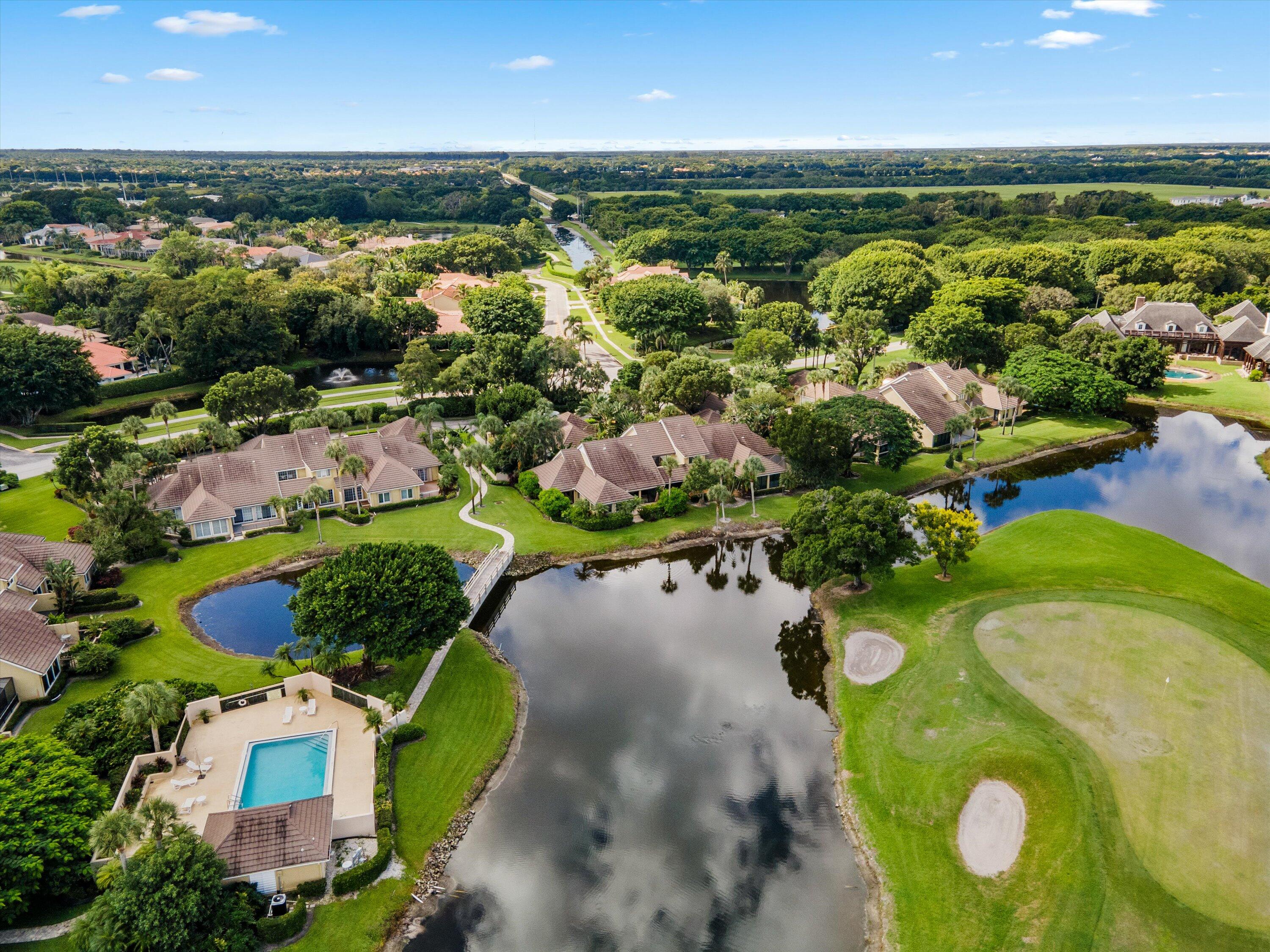 13224 Polo Club Road, Unit A204 Wellington, FL 33414 - Photo 27 of 27 an aerial view of a house with a swimming pool yard and outdoor seating