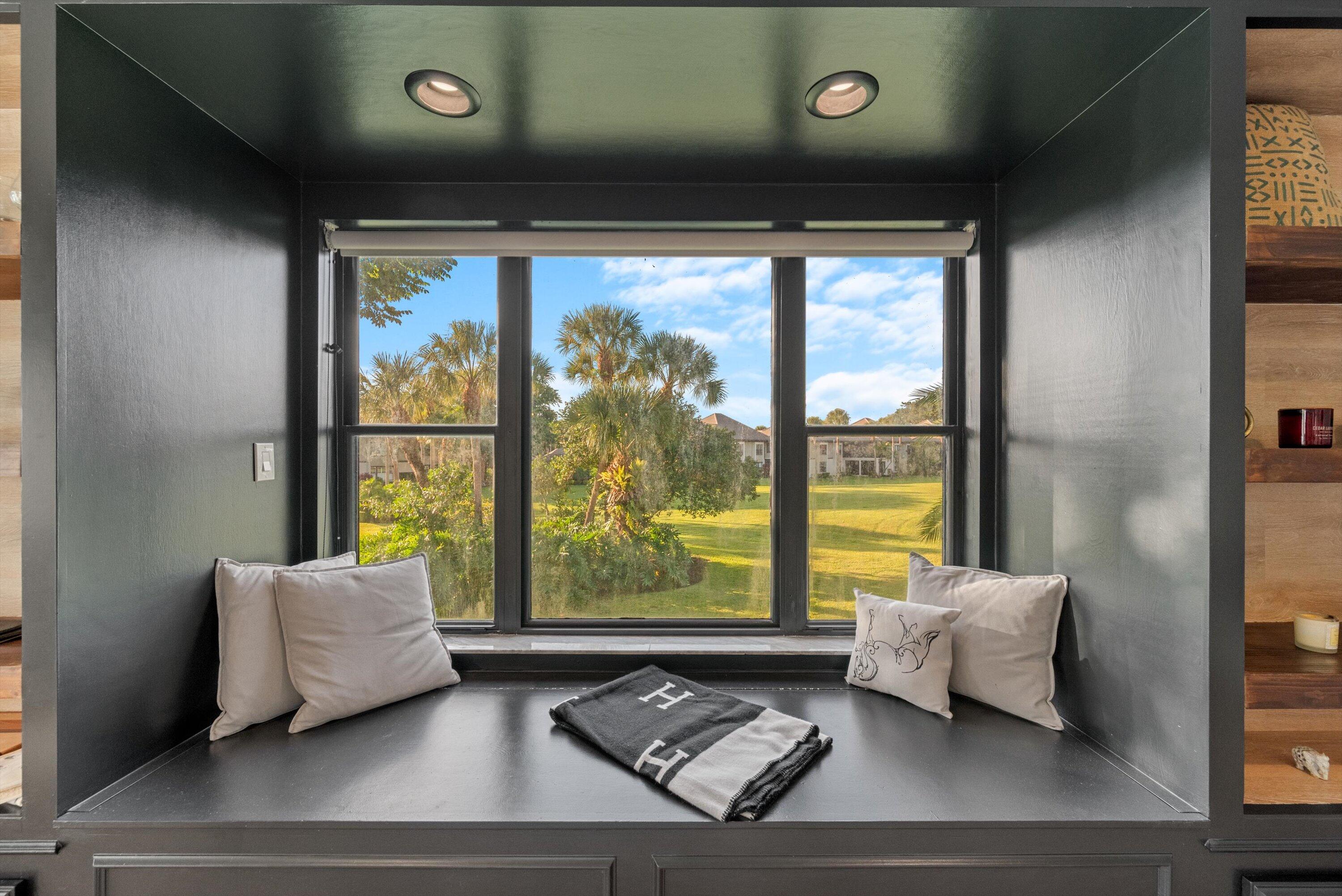 13224 Polo Club Road, Unit A204 Wellington, FL 33414 - Photo 5 of 27 a living room with furniture and a large window