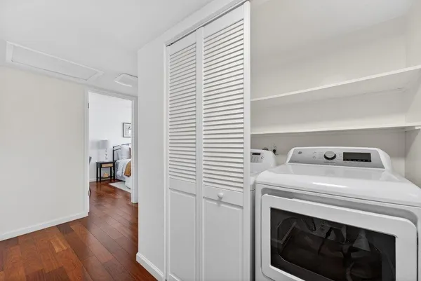 a utility room with washer and dryer
