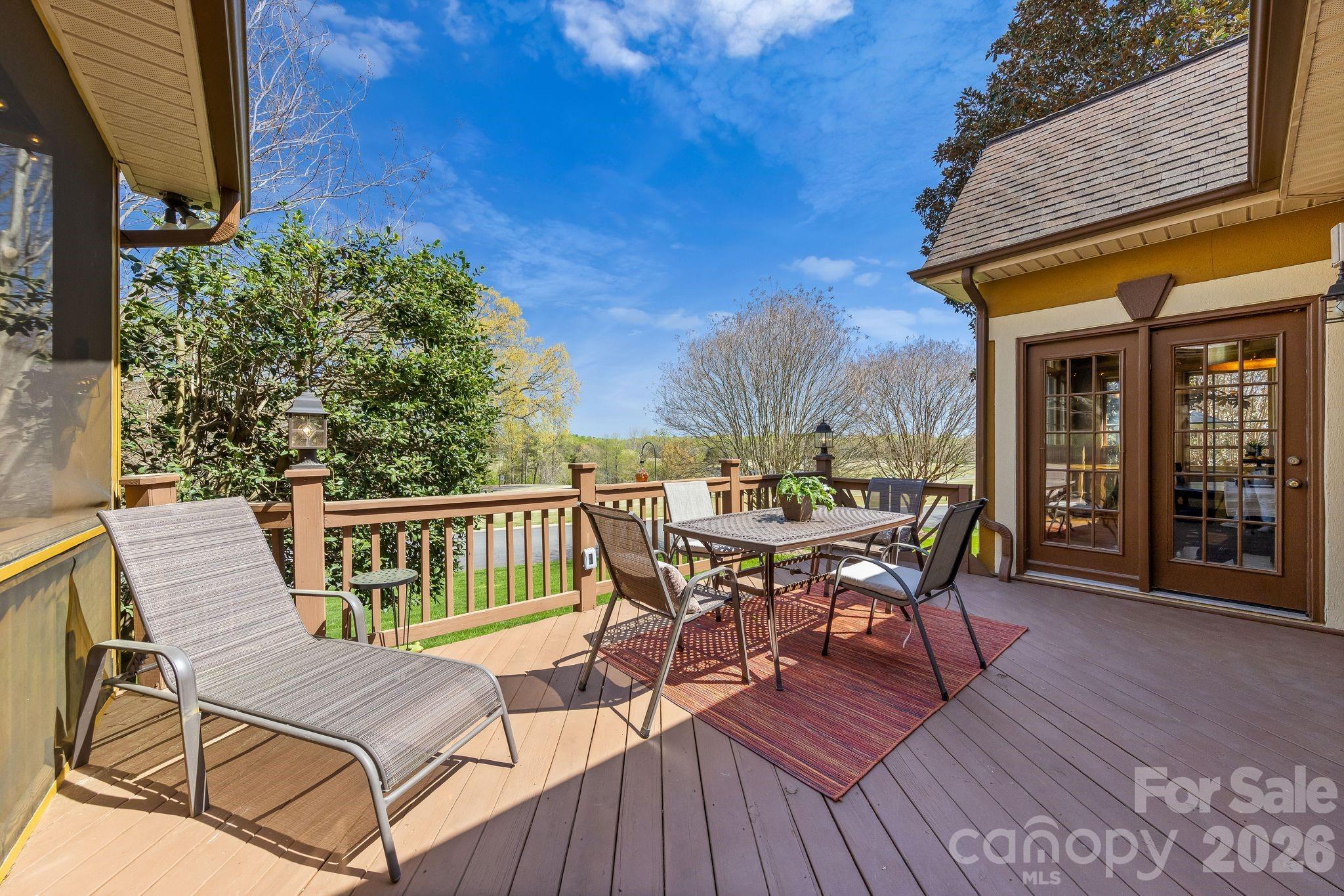 3530 Cardiff Lane Matthews, NC 28104 - Photo 15 of 39 a view of a chairs and table on the wooden floor