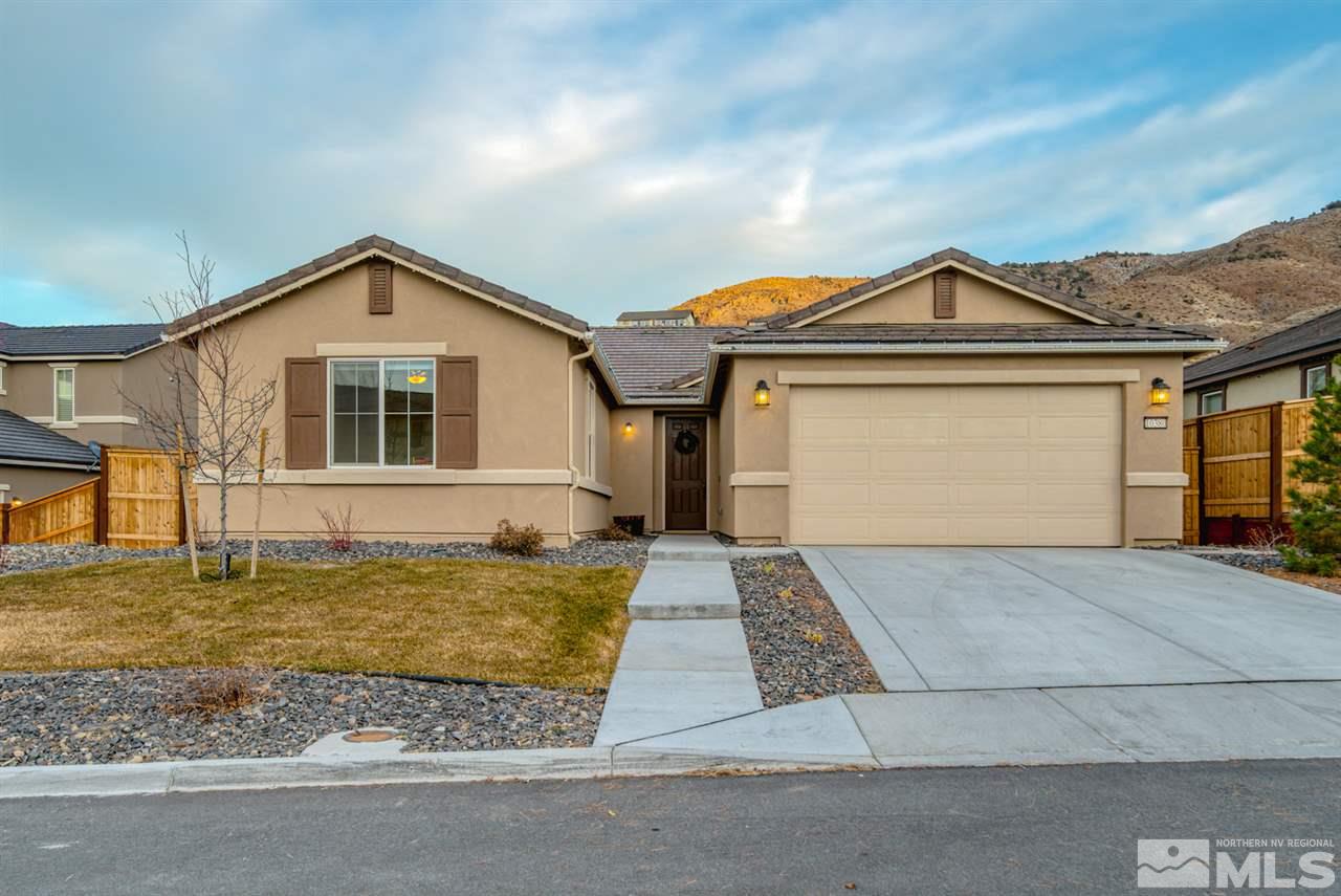 10380 Gold Mine Drive Reno, NV 89521 - Photo 1 of 23 a front view of a house with a yard