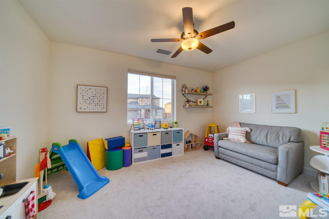 10380 Gold Mine Drive Reno, NV 89521 - Photo 18 of 23 a living room with furniture and a large window