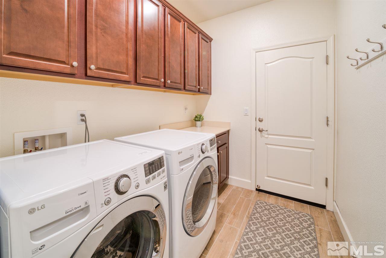 10380 Gold Mine Drive Reno, NV 89521 - Photo 21 of 23 a utility room with dryer and washer