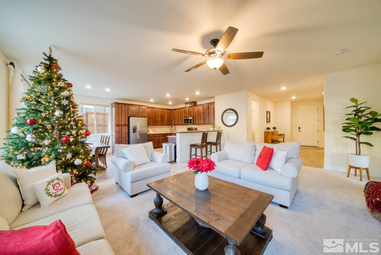 10380 Gold Mine Drive Reno, NV 89521 - Photo 5 of 23 a living room with furniture and a chandelier