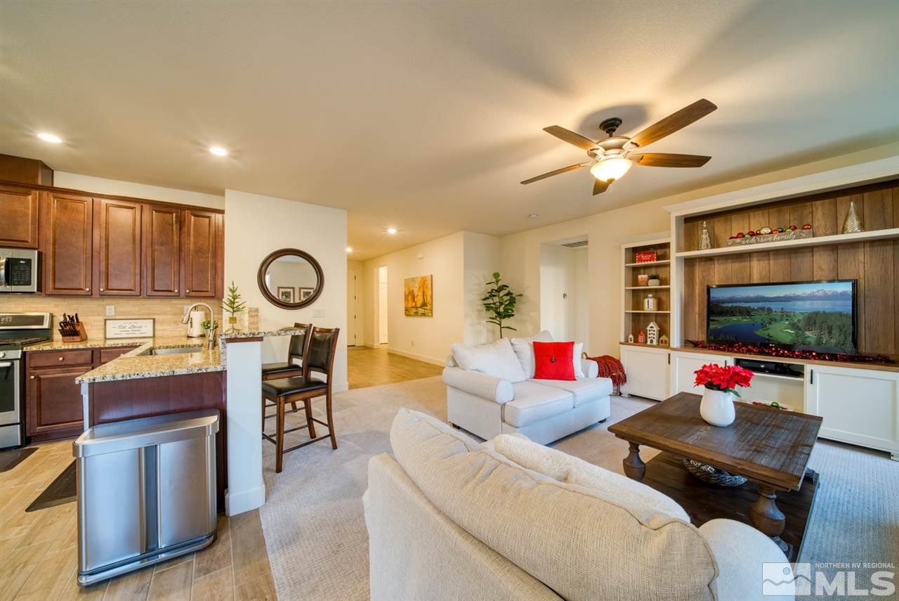 10380 Gold Mine Drive Reno, NV 89521 - Photo 7 of 23 a living room with furniture and a flat screen tv