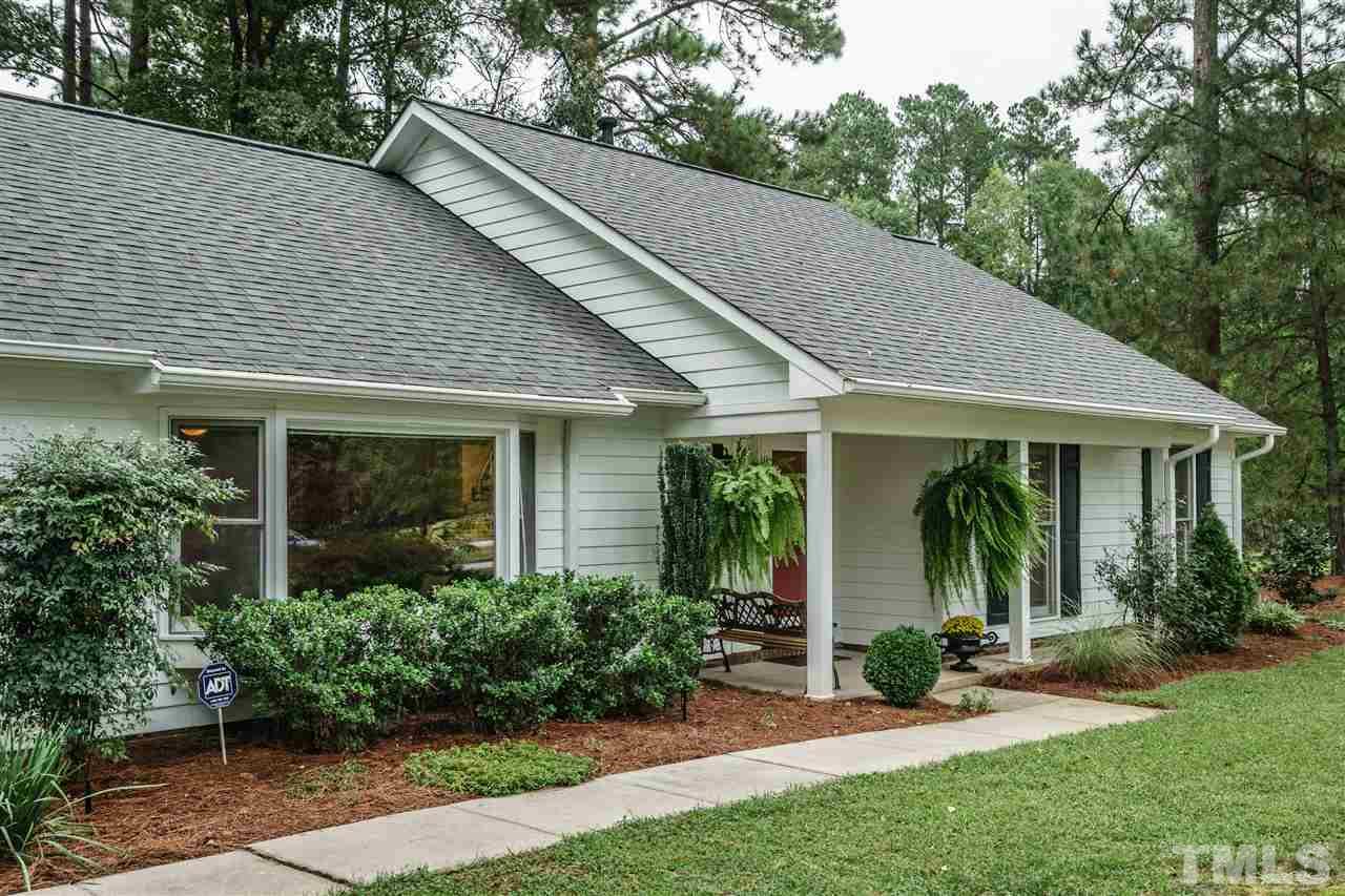 1300 Buckhorn Road Garner, NC 27529 - Photo 2 of 25 a view of a house with garden and porch