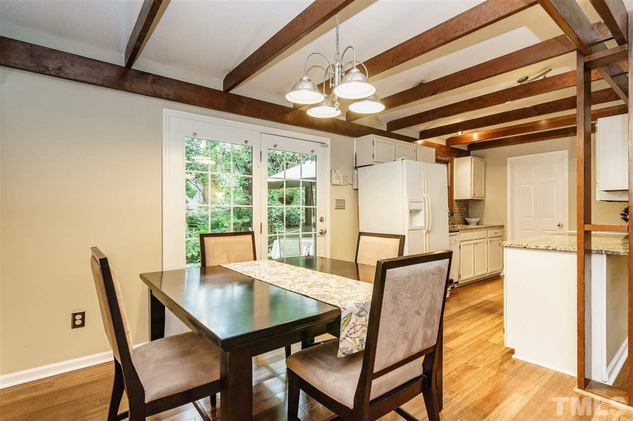 1300 Buckhorn Road Garner, NC 27529 - Photo 11 of 25 a view of a dining room with furniture window and wooden floor
