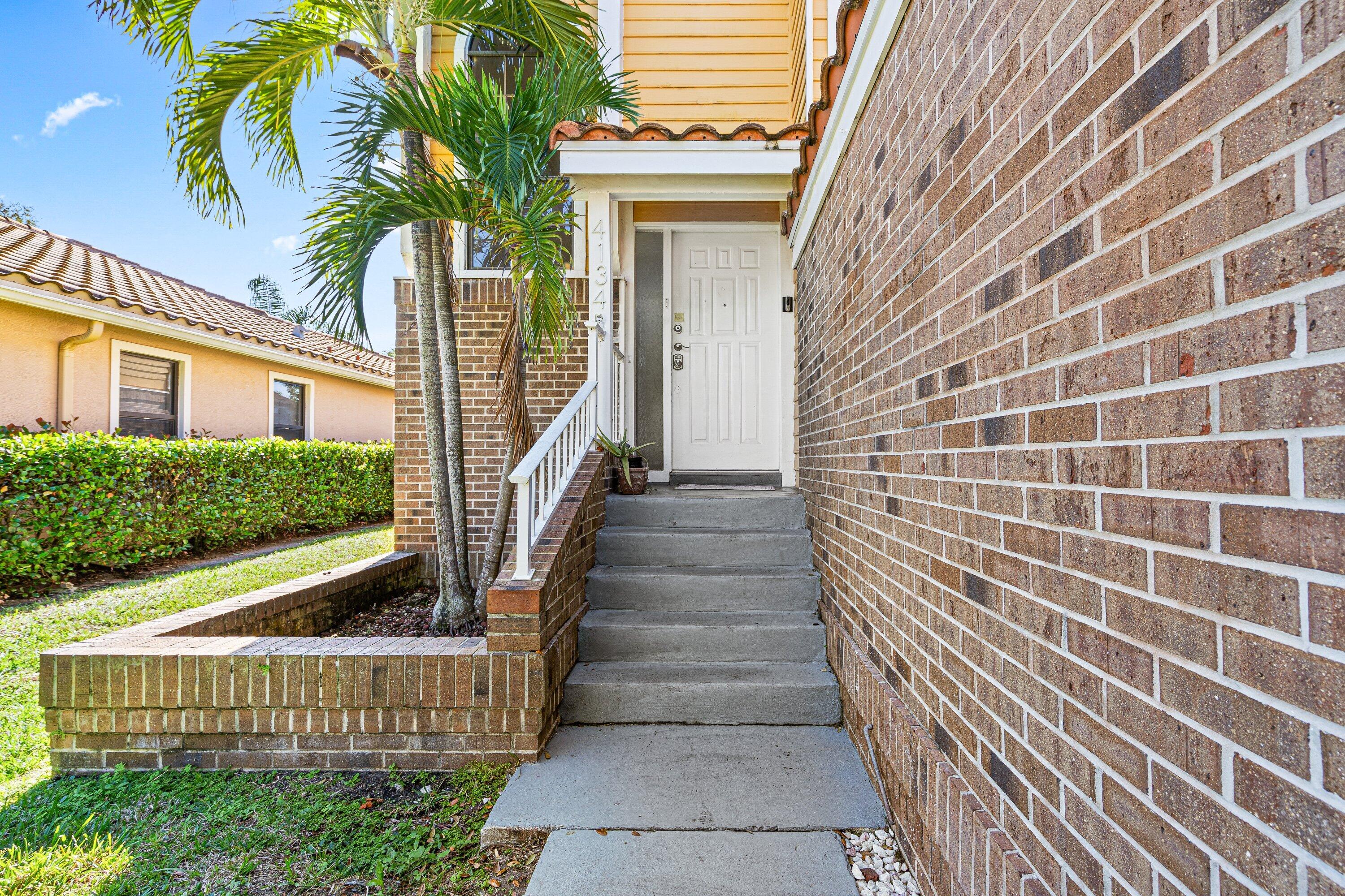 4134 Northwest 2nd Lane Delray Beach, FL 33445 - Photo 2 of 28 a view of entryway with a front door