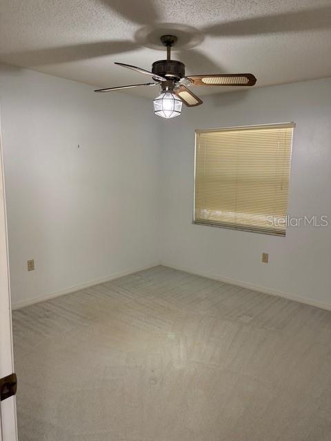 1638 Lamplighter Way Orlando, FL 32818 - Photo 18 of 25 en empty room with a window
