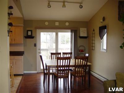 202 Ruth Road Bath, PA 18014 - Photo 4 of 10 a view of a dining room with furniture and window