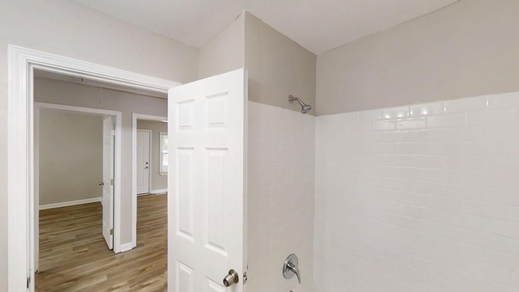 568 McWilliams Road Southeast Atlanta, GA 30315 - Photo 11 of 17 a bathroom with a shower