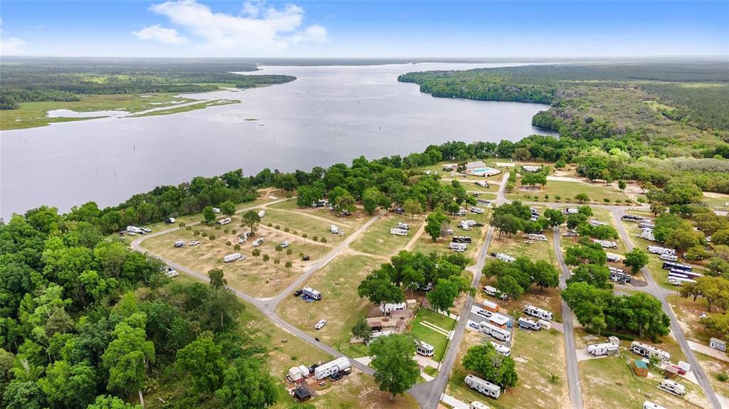 15991 Northeast 243rd Place Road, Unit 143 Fort McCoy, FL 32134 - Photo 3 of 35 an aerial view of beach and ocean