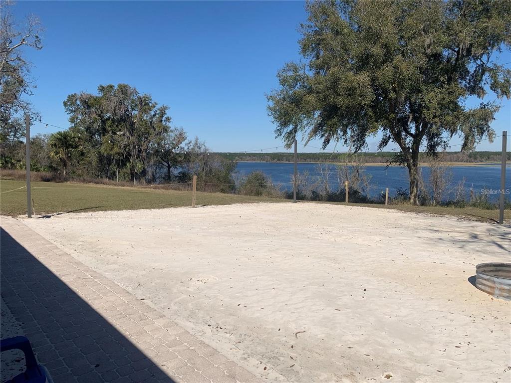 15991 Northeast 243rd Place Road, Unit 143 Fort McCoy, FL 32134 - Photo 32 of 35 a view of swimming pool with a yard