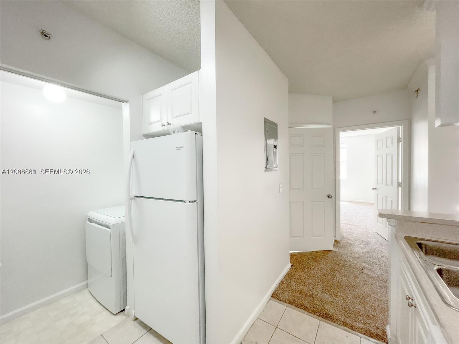 17150 North Bay Road, Unit 2602 Sunny Isles Beach, FL 33160 - Photo 10 of 27 a view of a kitchen with a sink