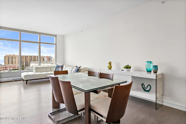 a view of a dining room with furniture window and outside view
