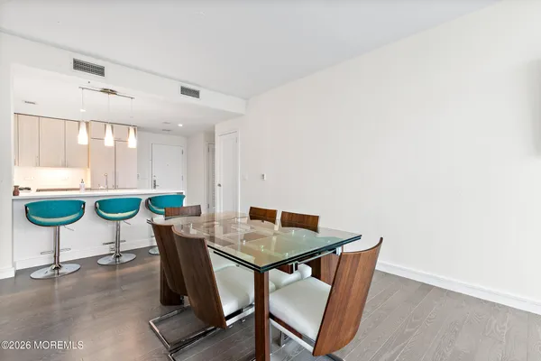 a view of a dining room with furniture