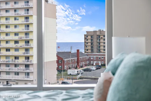 a view of a city with tall buildings