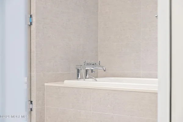 a bathroom with a bathtub