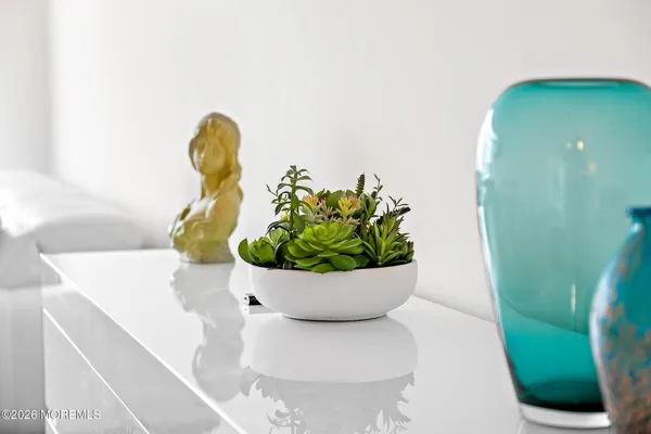 a vase of flowers sitting on a table