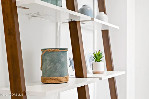 a utility room with sink dryer and washer