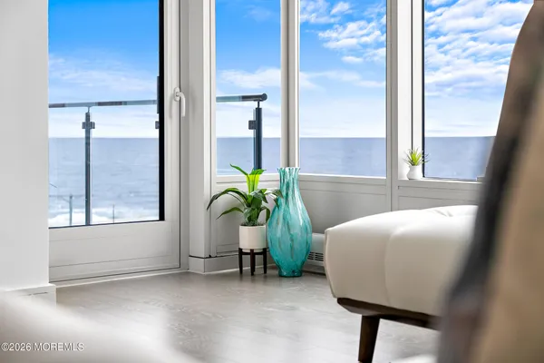 a view of living room with a window and furniture