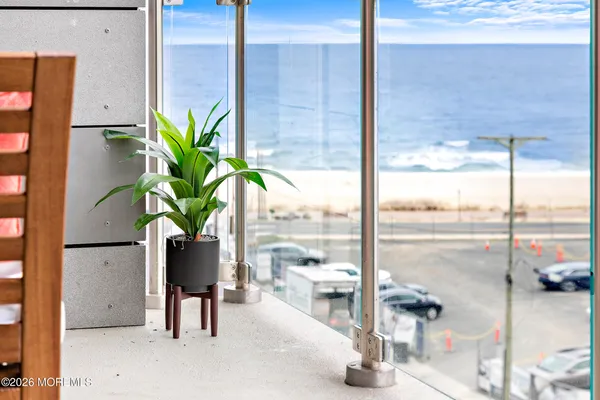 a potted plant sitting on a table next to a window