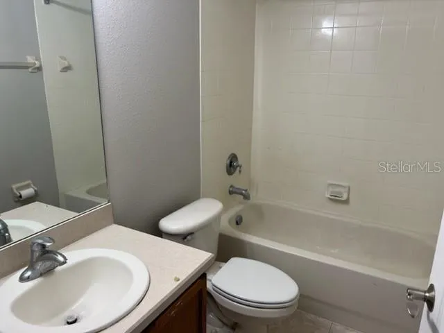 a bathroom with a sink toilet and a bathtub