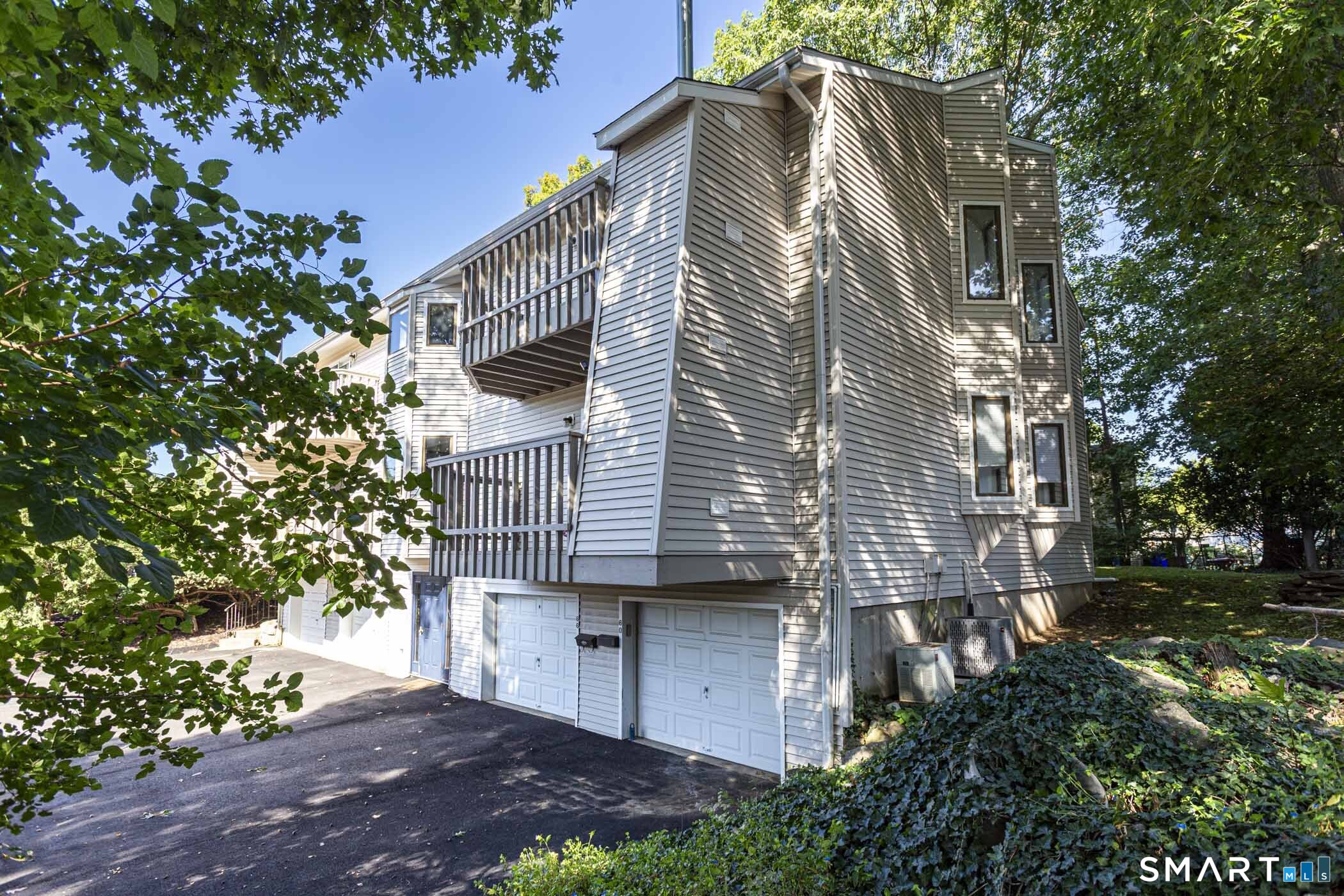 60 Overlook Avenue, Unit 60 Fairfield, CT 06824 - Photo 35 of 36 Condo garage is the first from the side