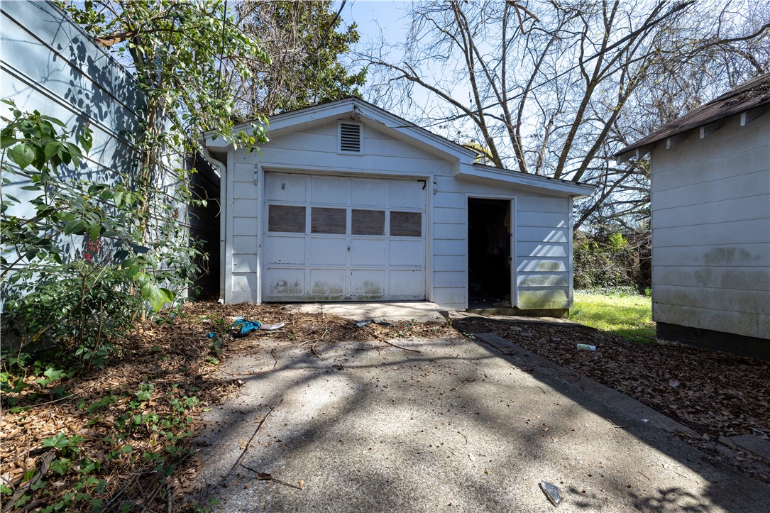 106 Frances Street Anderson, SC 29621 - Photo 15 of 15 This outdoor space offers convenient parking with a classic garage door.