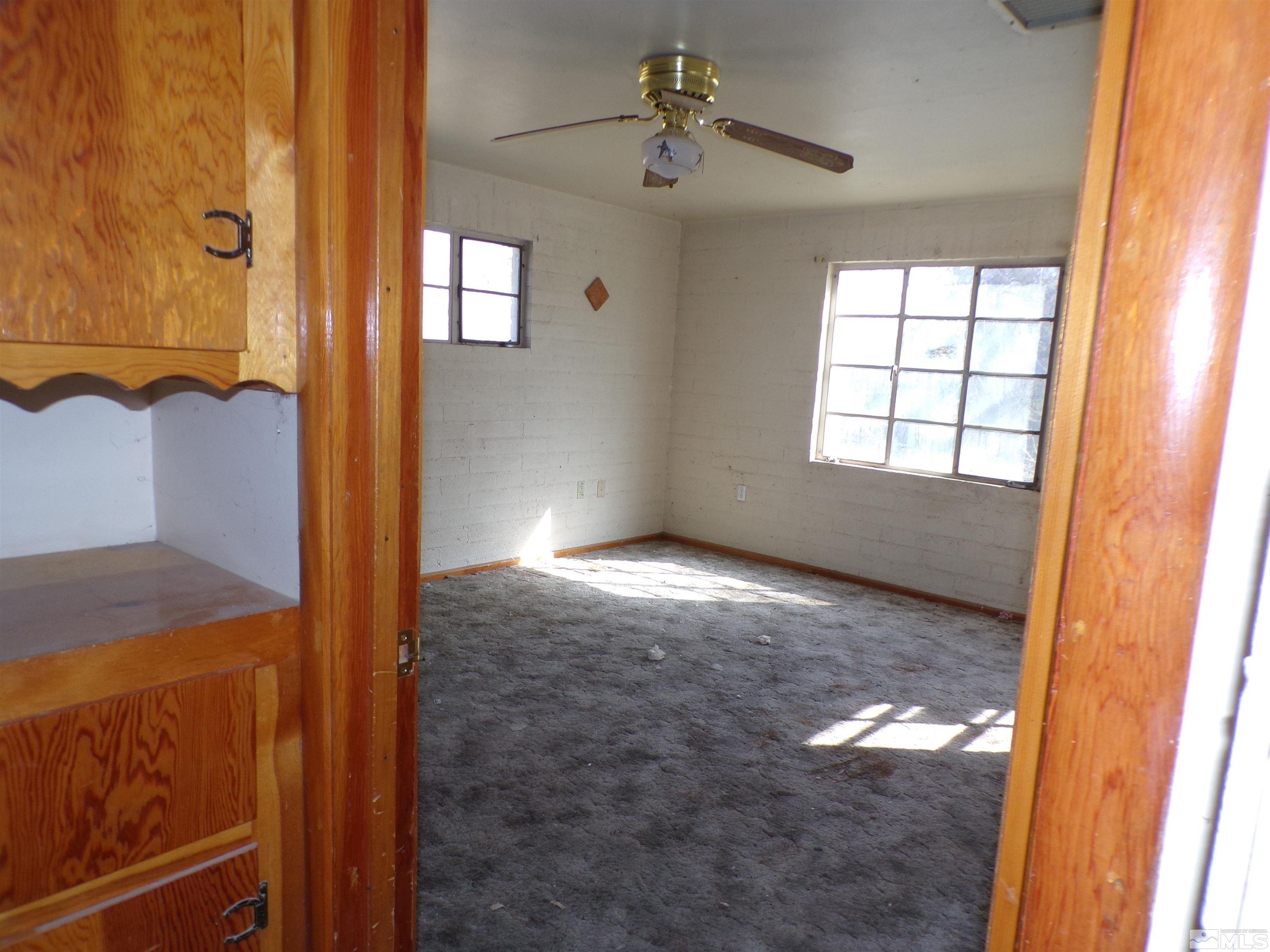 5890 Rivers Edge Drive Fallon, NV 89406 - Photo 11 of 24 a view of an empty room and window