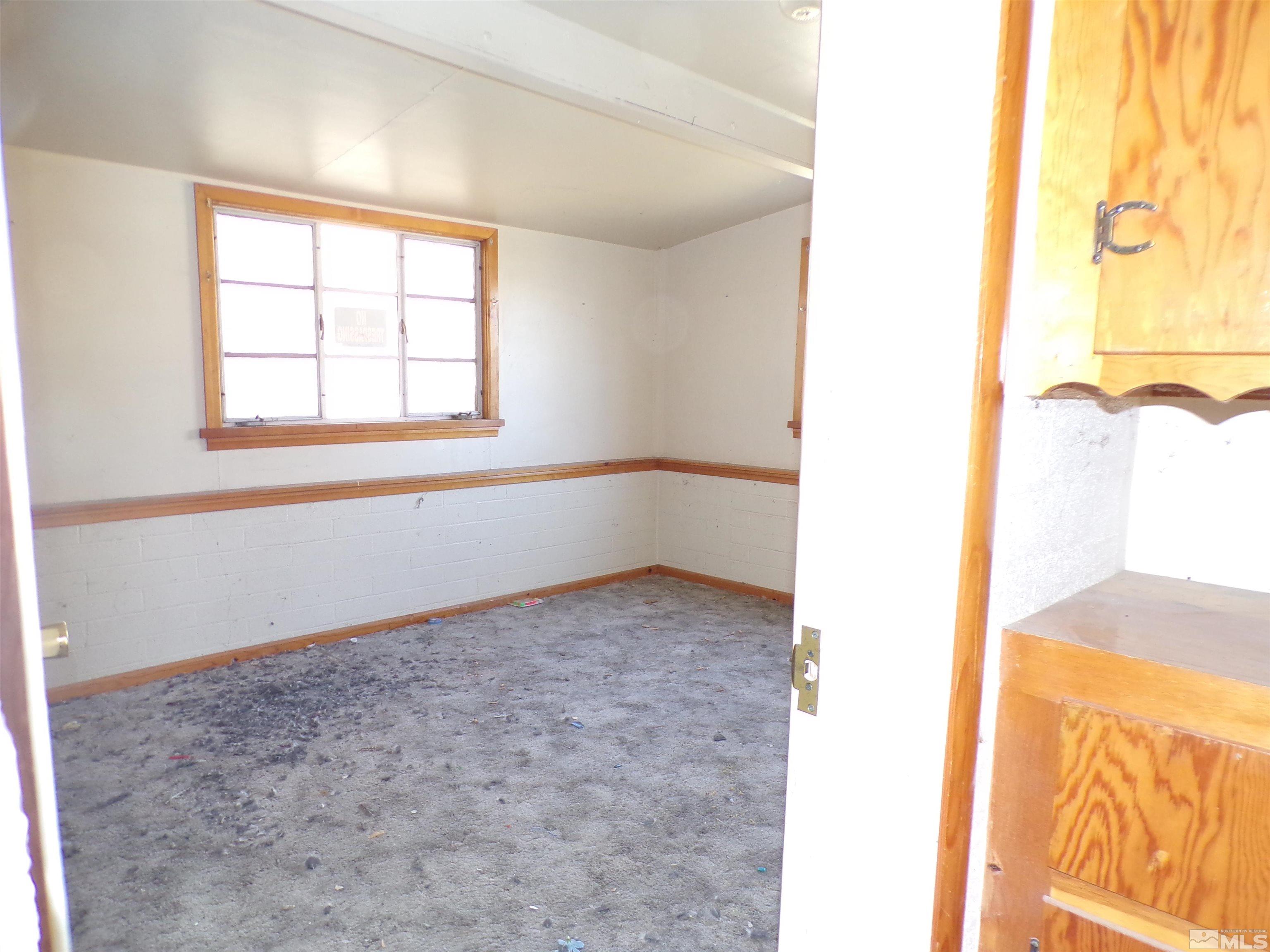 5890 Rivers Edge Drive Fallon, NV 89406 - Photo 12 of 24 a view of an empty room and window