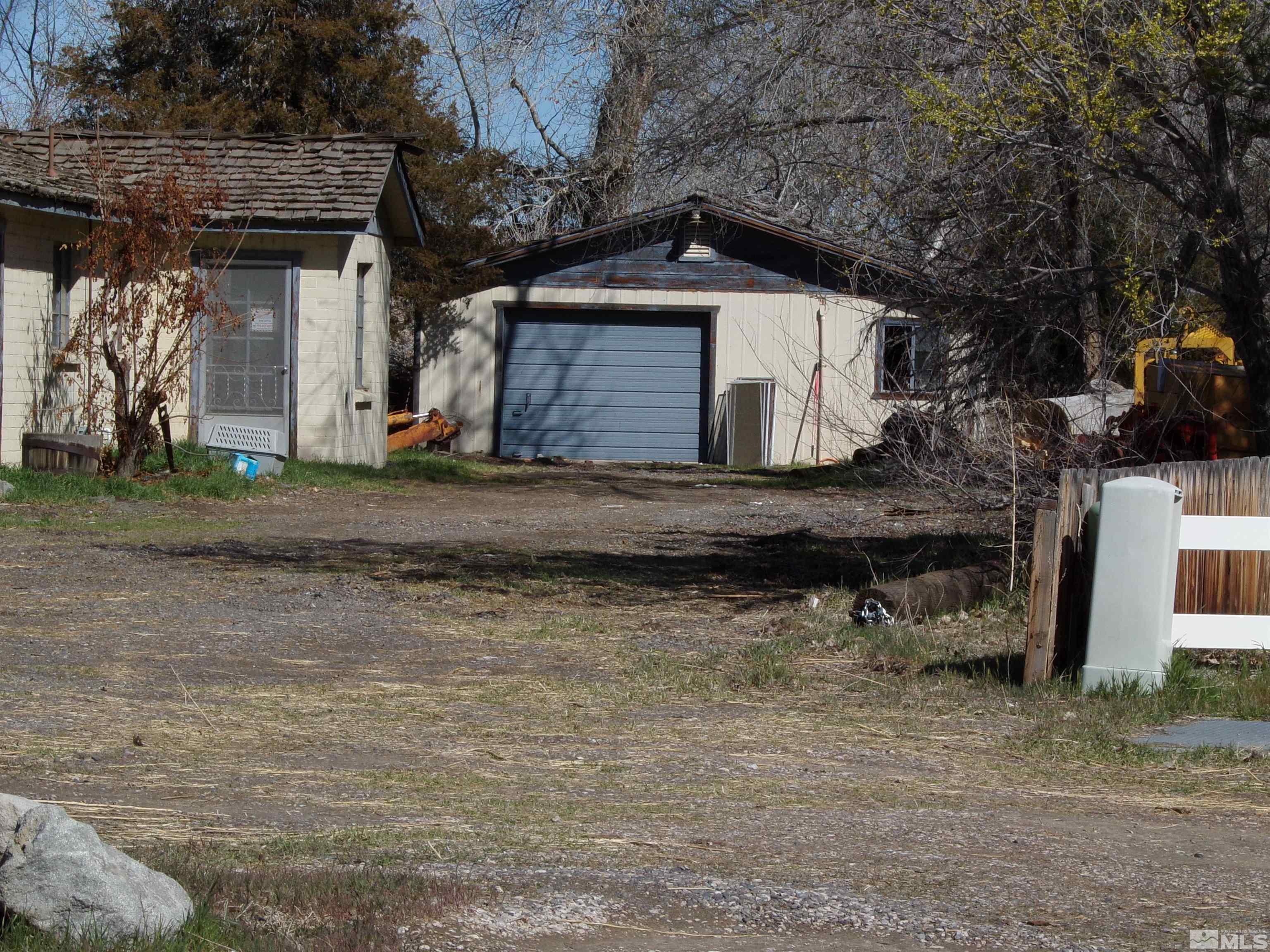 5890 Rivers Edge Drive Fallon, NV 89406 - Photo 15 of 24 a view of a house with a yard